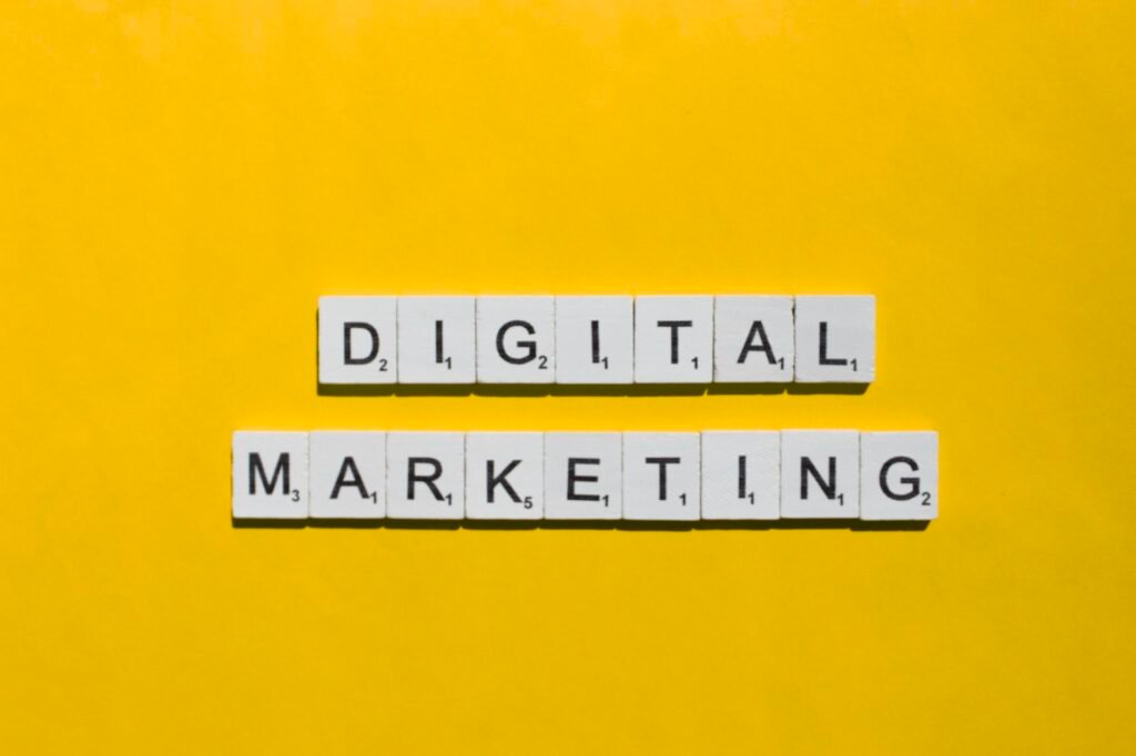 Digital marketing scrabble letters word on a yellow background